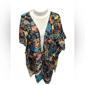 Women’s One Size Fits most Floral Multicolor Kimono in never worn condition.